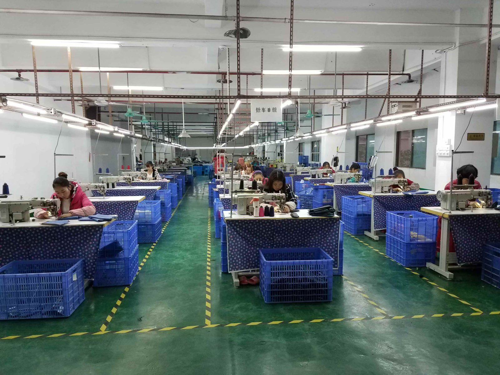 Long production line inside the sewing and assembly workshop